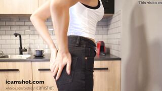 A WOMEN WITH A LONG BUTT MOVES SLOWLY AND TAKES