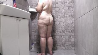 Old big boobed bbw cougar inside the shower.