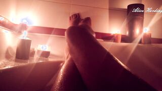 Wifey bathes into the WC by candlelight washes herself and massage her vagina