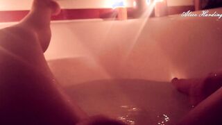 Wifey bathes into the WC by candlelight washes herself and massage her vagina