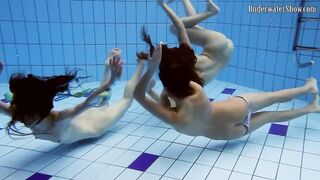 Fun nude girls got sensual into the pool