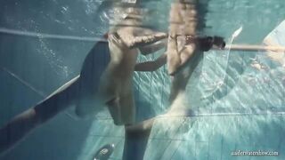 Fun nude girls got sensual into the pool