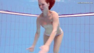 Fun nude girls got erotic into the pool