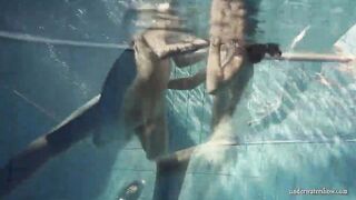 Fun nude girls got erotic into the pool