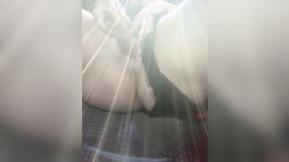 Masturbating into vehicle inside busy parking lot