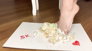 Crushing cake with foot