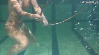 Russian dyke girls swimming into the pool