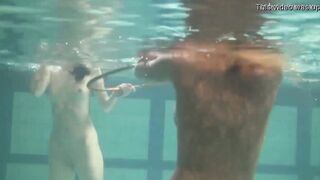 Russian dyke girls swimming into the pool