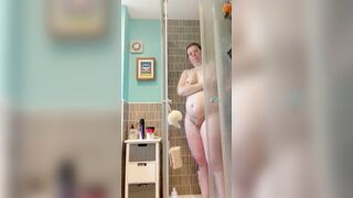 Pregnant red head mom getting undressed and taking a shower