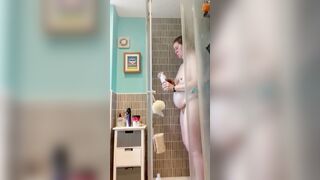 Pregnant red head mom getting undressed and taking a shower