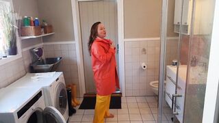 Having Fun with long boobies and rubbing oil into rainpants
