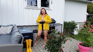 Getting clothed inside rubber dress, stay ups, raincoat and latex boots