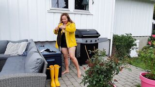 Getting clothed inside rubber dress, stay ups, raincoat and latex boots