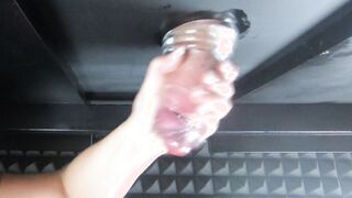Massaging clients penis with a plowed sleeve (milking table) Noisy stroking sounds with lots of cum.