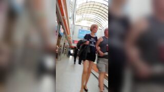 Mature Lady in short jean skirt nude tights upskirt oopsy