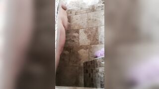Real amateur cougar fucks her sex toy while taking a shower. ALL NATURAL, long boobies & long butt from all sides.