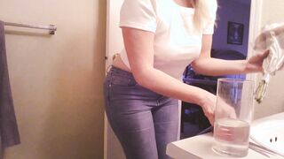I had another accident inside your WC Daddy. Blonde Pawg Hotwife piss cup Jeans Soak white Tshirt
