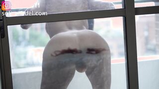 Having Fun outdoor with my vibrator against the glass