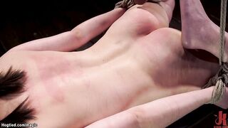 Sub takes crotch rope and whip