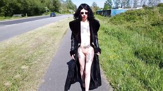 skank lucy ravenblood walking nude at a outdoors road