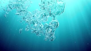 Underwater lesbians lick and suck dildos