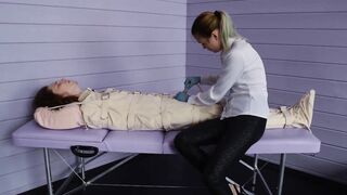 Figging with red head and Foley bladder catheterization inside fetish body bag. Medical play.