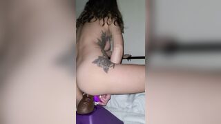 Rides big black dick toy until the cunt squirts