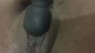 African Teases Her Long Clitoris With a Dildo