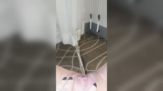 Erotic pisser wets hotel carpet and drapes
