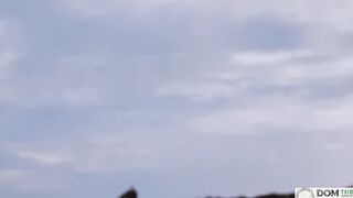 Italian Goddess Silvia Soprano worships her dominant's butt and toes as they walk along the sea