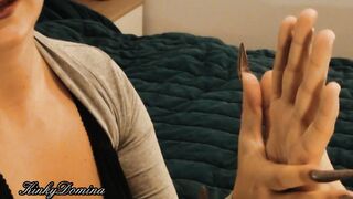 Comparing Hands with the Queen of Huge Nails