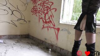 Submissive mom into high boots kneels inside front of her master and blows his penis inside an abandoned house