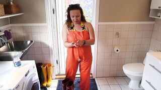 Vulgar mom dressing up into rainpants - oiling big melons