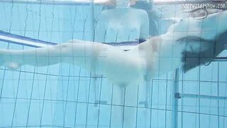 View them hotties swim nude inside the pool