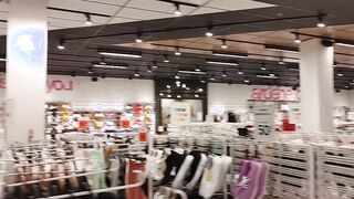 Woman finger fucked soak puusy into shiny leggings,inside clothing store