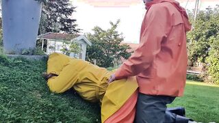 HornyMILF gets filled with huge cock wearing rainwear and pvc boots outdoor