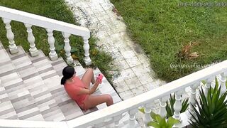 Martina is filmed from afar by a fan while she