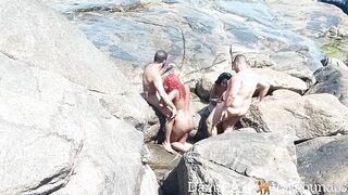 Naturists caught on the beach at an outside group sex -