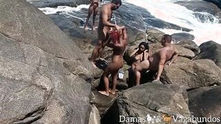 Naturists caught on the beach at an outside group sex -