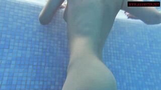 Dark Hair long jugs sexy Mia Ferrari swims in the pool