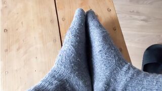 toes into socks. devils pedicure into socks. socks