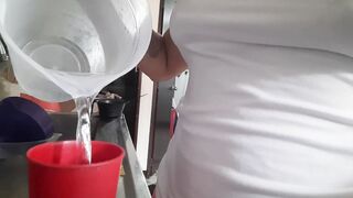 PISSING AMATEUR Latin bimbos drinks water, fills her bladder and pee on the restroom