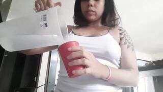 PISSING AMATEUR Latin bimbos drinks water, fills her bladder and pee on the restroom