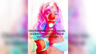 Goddess CLOWN blowing on a banana and having fun with her titties