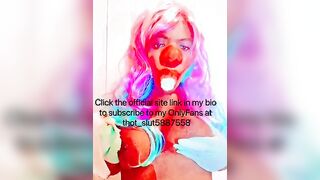 Goddess CLOWN blowing on a banana and having fun with her titties