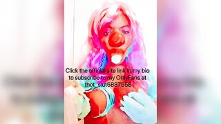 Goddess CLOWN blowing on a banana and having fun with her titties