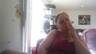Voluptuous Dark Haired smoking and cuming!