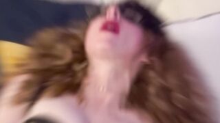Red Headed milf teases with a Glass sex toy into a small soak Cunt
