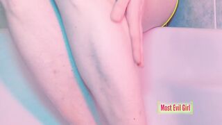 Peeing into the bath-tub and finger fucked her open vagina