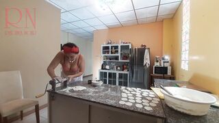 A nude housewife is preparing dinner inside the kitchen. The depraved whimsical housekeeper Bra one